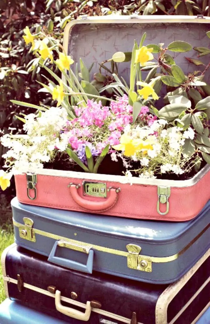 Jardinera de jardín de maleta vintage DIY